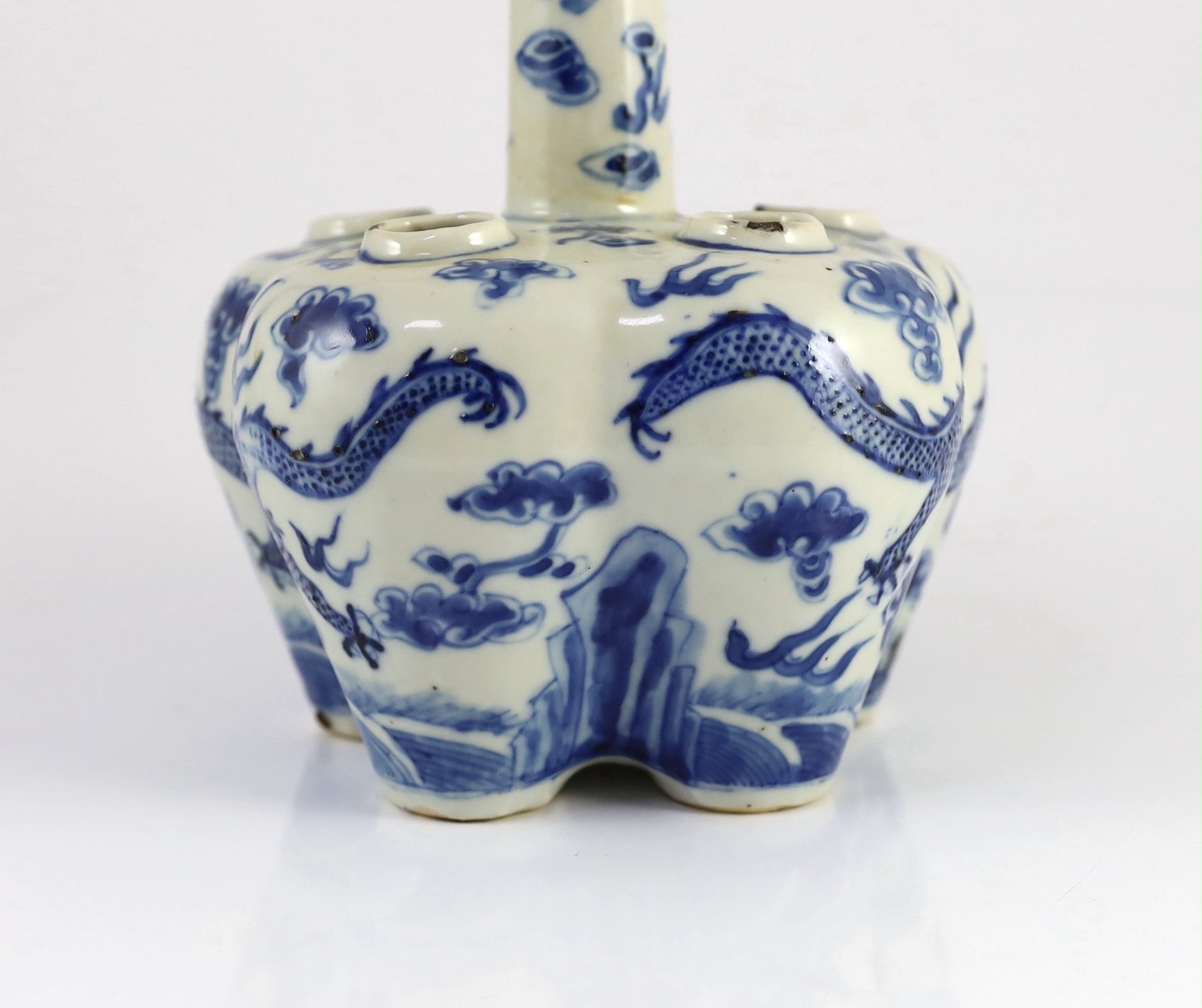 A Chinese blue and white ’dragon’ tulip vase, 19th century, 25cm high, splinter chips